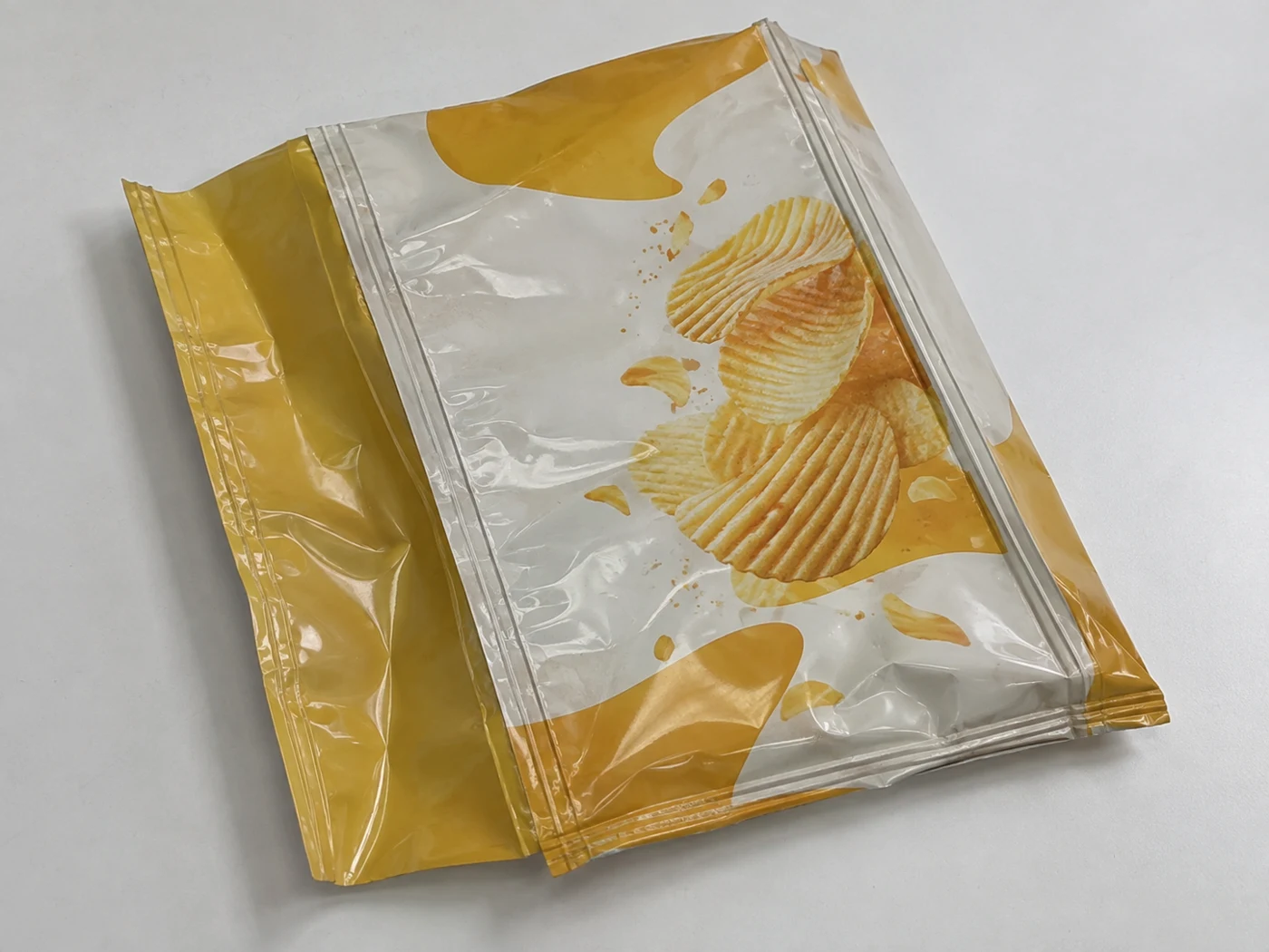 Flat empty quad seal gusset bags with snacks artwork