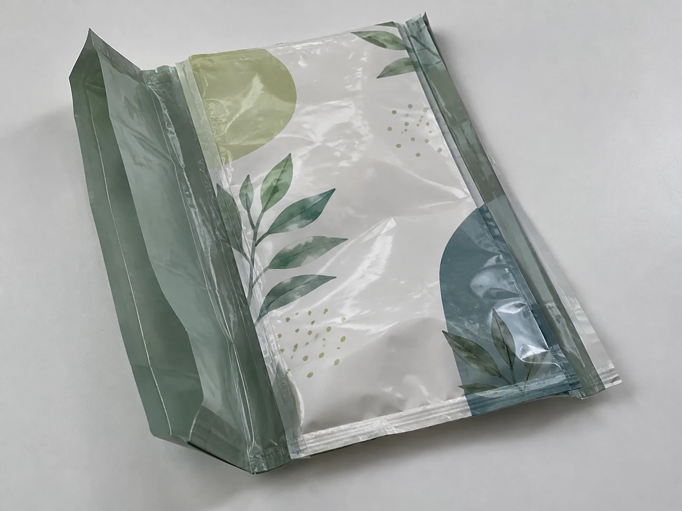 Flat empty quad seal gusset bags with refill artwork