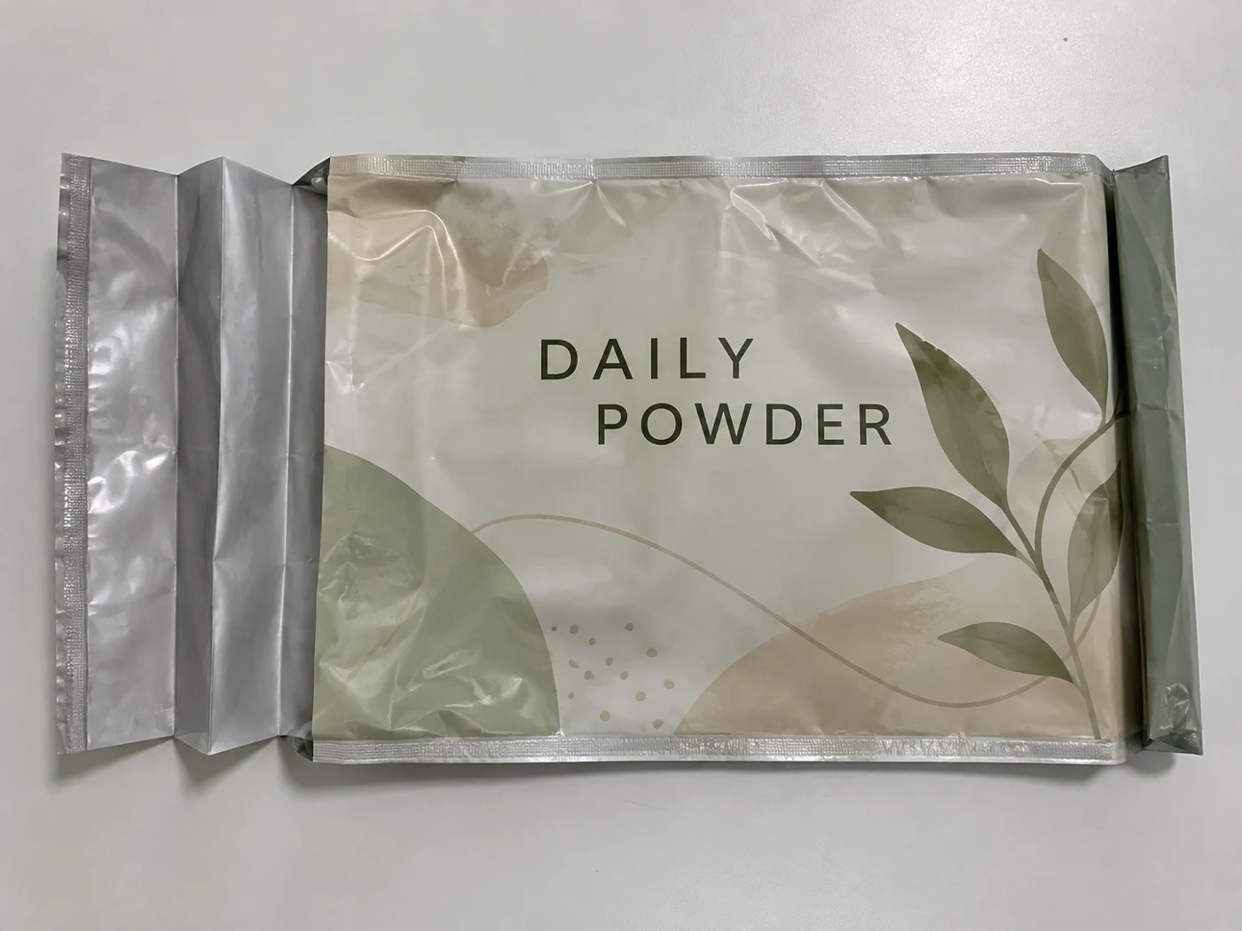 Flat empty side gusset bags with daily powder artwork