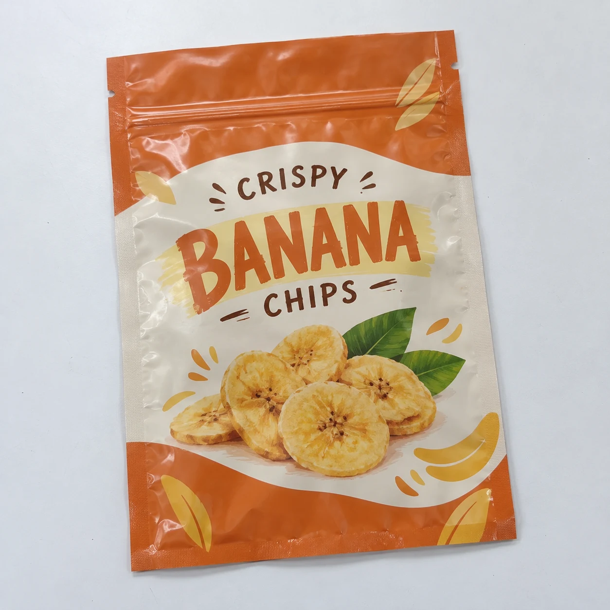 Flat empty three side seal zipper pouches with snacks artwork